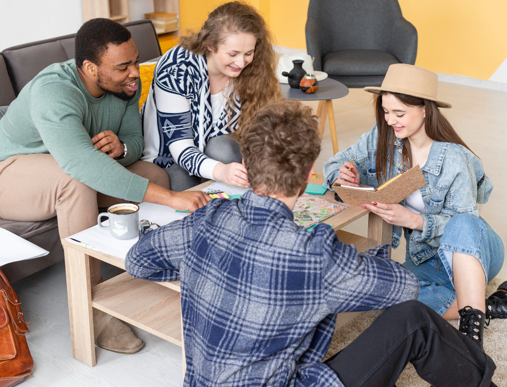 College students in a classroom playing an icebreaker game