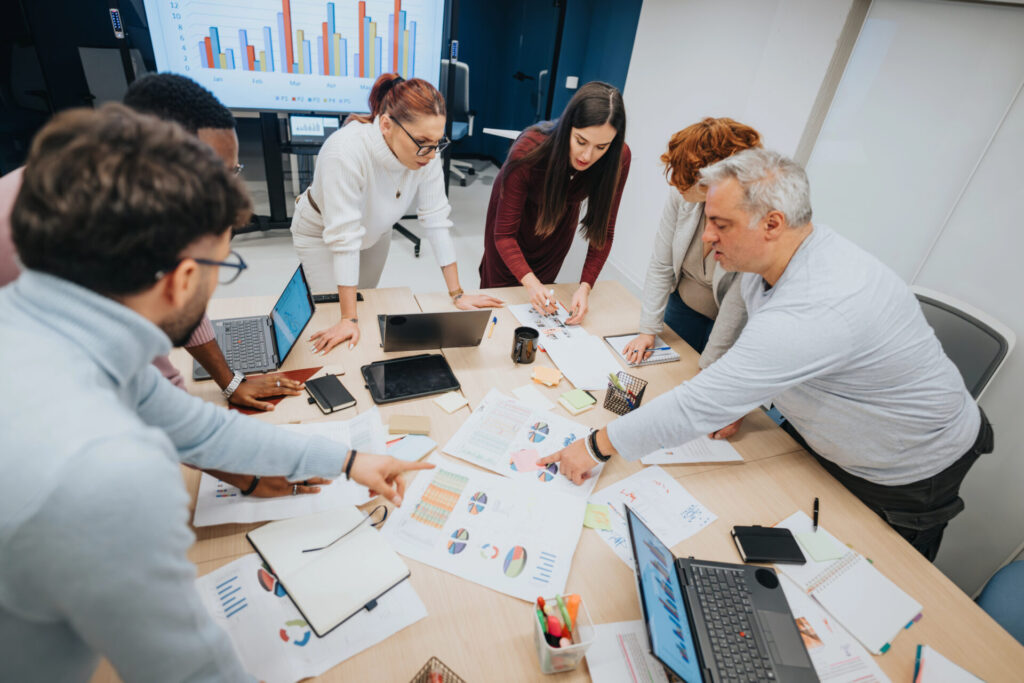 people around a workshop table